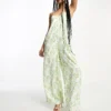 Glamorous Petite Lace Back Strappy Smock Jumpsuit In Green Floral For Women White Painted Floral